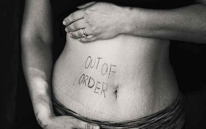 stomach that has out of order written on it